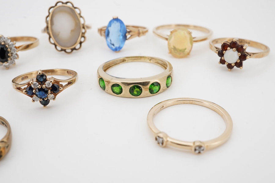 A group of assorted modern 9ct and gem set rings including opal and seed pearl and turquoise and one other 10k ring. Condition - fair to good